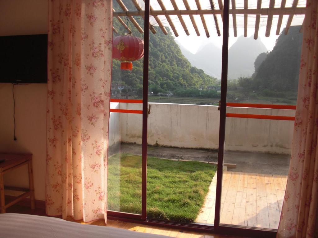 Huanggong Garden Hotel Yangshuo Zimmer foto
